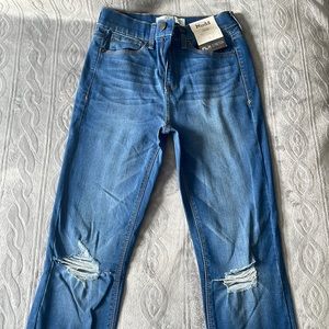 Mudd high rise skinny blue jeans. With holes. Size 3. Never worn with tags.